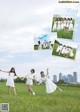 A group of young women holding hands in a field.